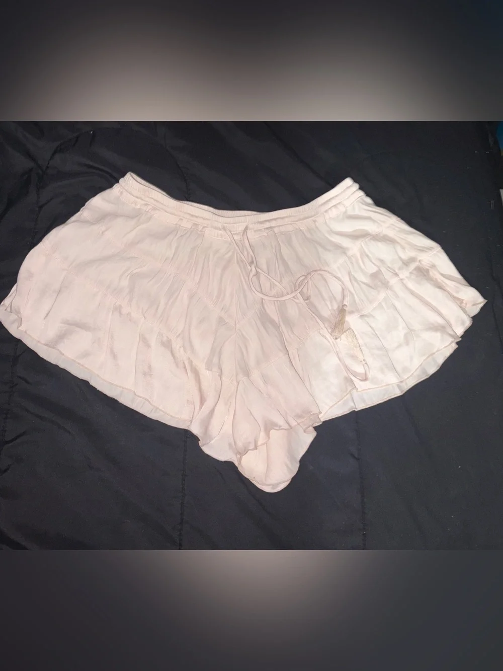 Pink ruffle shorts with drawstring waist